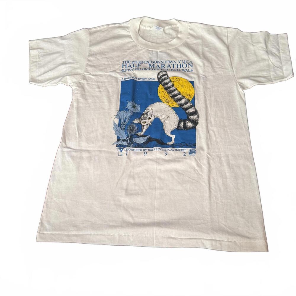 Vintage-Style White Graphic T-Shirt with Blue & Yellow Print